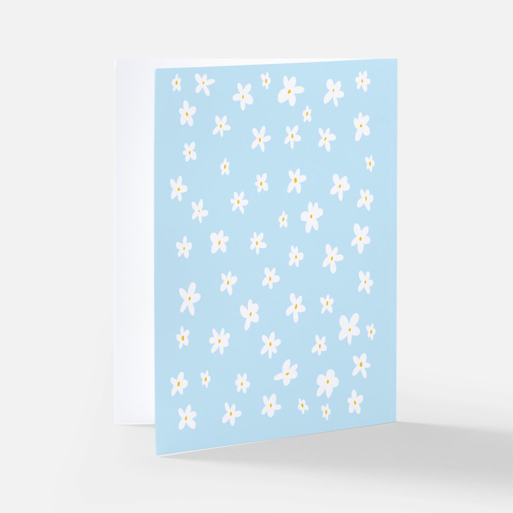 daisies in bloom! blue greeting card